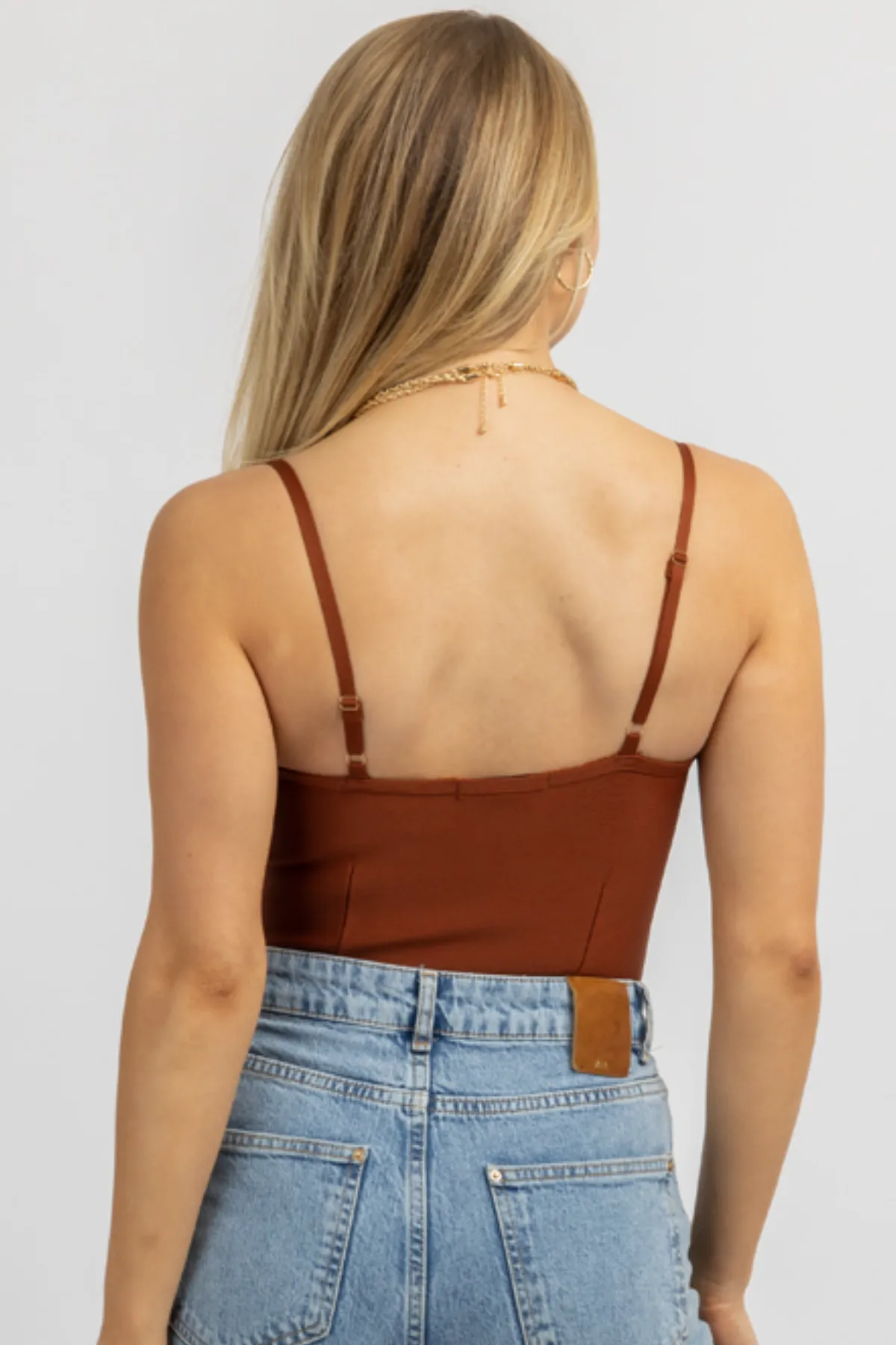 BRICK BUSTIER SLEEVELESS STRETCH BODYSUIT